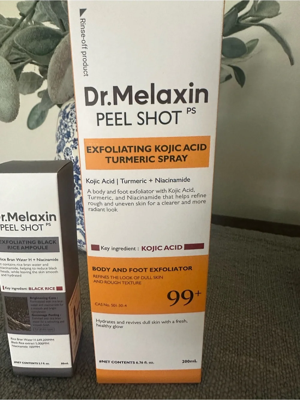Dr. Melaxin Peel Shot Exfoliating Kojic Acid Turmeric Spray and black rice